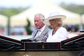 The Prince of Wales with The Duchess of Cornwall are seen in the royal procession during Day Two of Royal Ascot 2022