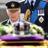 King Charles III walks behind the coffin of Queen Elizabeth II. Photo: Getty