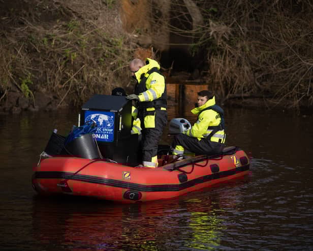 Specialists search the River Wyre this morning (February 6).