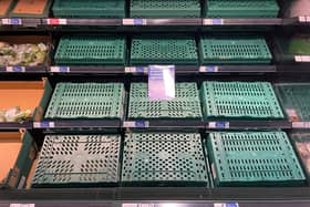 Empty shelves are seen in the fruit and vegetable aisles of a Tesco supermarket on February 22, 2023 in Burgess Hill.