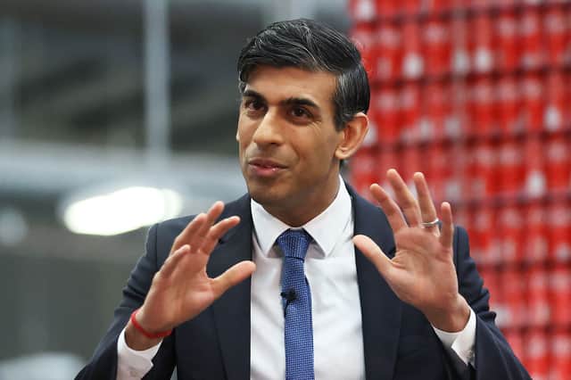 Rishi Sunak holds a Q&A session with local business leaders during a visit to Coca-Cola HBC in Lisburn (POOL/AFP via Getty Images)