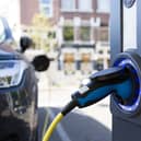 Electric vehicles are at the forefront of new driving laws and offences introduced in April 2023 - Credit: Adobe