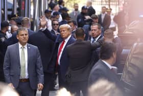 Trump reportedly entered the court buildings via a more discreet side entrance  (Photo by Kena Betancur/Getty Images)