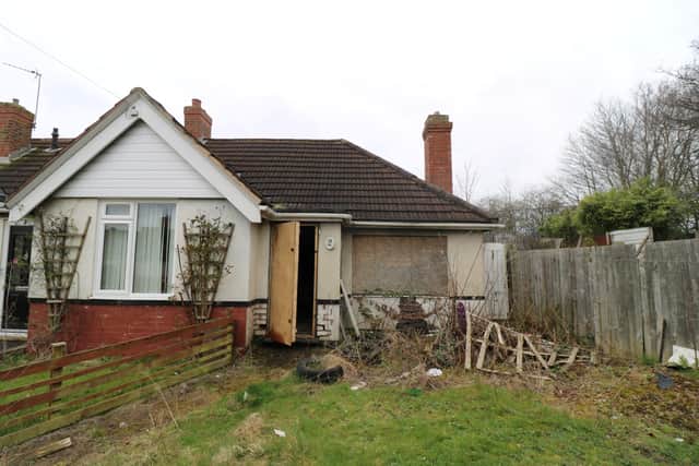 Outside the house in Walsall, West Midlands. 