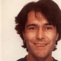 Human remains found in Welsh woodland have been confirmed to be that of Russell Scozzi, a computer expert who was last seen 20 years ago. 