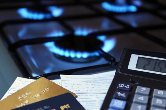Gas stove, bank cards and calculator