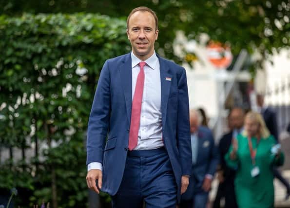 Labour calls for “full investigation” into whether Hancock and other ministers used private email (Photo by STEVE REIGATE/POOL/AFP via Getty Images)