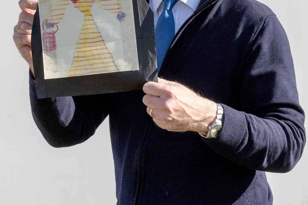 Charles Hanson, owner of Hansons Auctioneers, with a childhood drawing of Queen Elizabeth II drawn by a very young King Charles.  