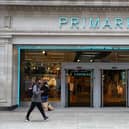 A pedestrian walks past a Primark store on Oxford Street, London.