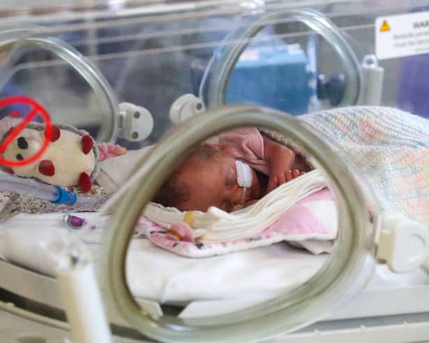 A newborn baby in the maternity ward at Frimley Park Hospital in Surrey on May 22, 2020 in Frimley, United Kingdom. (Stock Image. Credit: Steve Parsons - Pool/Getty Images)