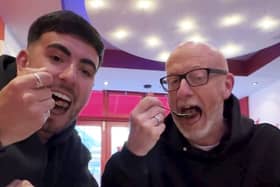 Callum Ryan and his dad Darren Ryan trying 'London's hottest curry' at Aladin in Brick Lane.