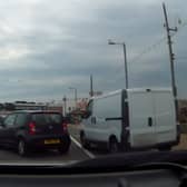 Van drives over busy pavement narrowly missing young girl in Paignton, Devon.