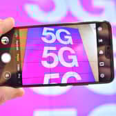 These are the 15 best cities to get a 5G signal on your phone in the UK according to OpenSignal. Photo: Justin TALLIS / AFP via Getty Images