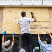 Shops on Old Market Road and West Street in Bristol board up their windows and close early amid planned far-right protests.