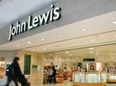 John Lewis profits rise.