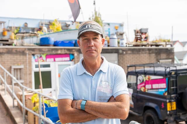 Robert Wood, 53, owner of Broadsands Beach Watersports Centre, Paignton, Devon faces a demolition order by Torbay Council as he has been asked to take down his rooftop garden that is loved by the community.