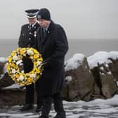 Paying respects at the Gynn Square memorial service to officers who died in the 1983 rescue mission at Blackpool.|Lucinda Herbert, Blackpool Gazette