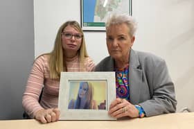 Katie Brett and Lorraine Beavers with a photo of Sasha Marsden.