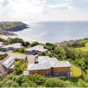 The Gower Peninsula in Swansea is one of the best places to live in the UK, according to the Sunday Times. This fabulous four-bedroom house looks out over Langland Bay, with its lovely sunny beach, and the nearby golf course.