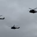 Puma helicopters fly over RAF Cosford.
