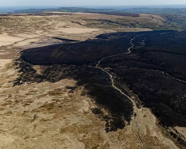 Aerial views show the aftermath after three blazes broke out at March Haigh Reservoir in Marsden. 