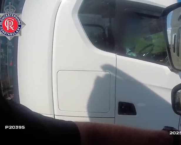 Lorry driver caught rolling cigarette with no hands on wheel