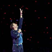  Chris Martin of Coldplay performs on a stop of the band's Music of the Spheres world tour at Allegiant Stadium on June 06, 2025 in Las Vegas, Nevada.