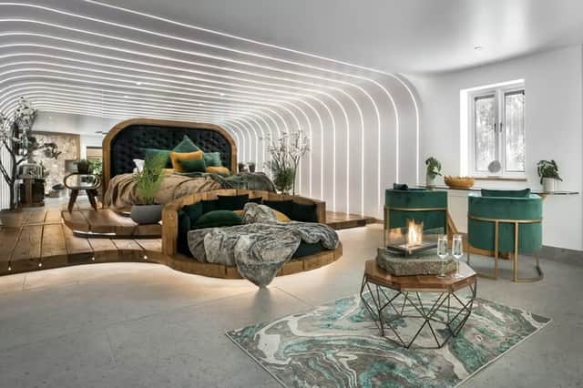 Sleek, modern and impossibly romantic — this standout suite is the epitome of Lake District luxury, complete with mood lighting, fire feature and plush velvet finishes