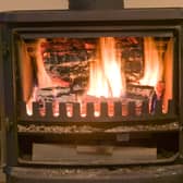 Stricter regulations now shape how and where wood burners can be used across the UK (Photo: Ashley Cooper/Construction Photography/Avalon/Getty Images)