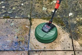 Algae builds up over damp winters - but there are some cheap tools to help you bring patios back from the brink