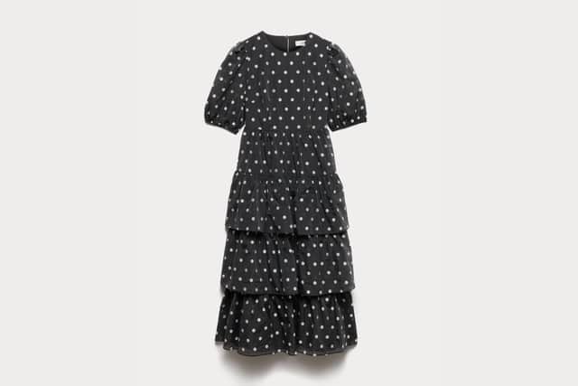 The M&S Lyocell Rich Polka Dot Midi Tiered Dress has been reduced by 50 per cent in the retailer's latest sale.