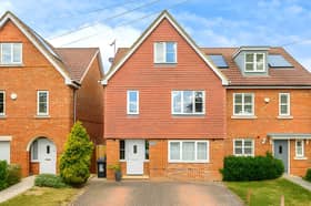 The Adeyfield Road home offers three floors of accommodation alongside driveway parking for up to four cars