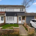 The end-of-terrace house on Frome Square has a driveway and a substantial side garage