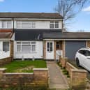 The end-of-terrace house on Frome Square has a driveway and a substantial side garage