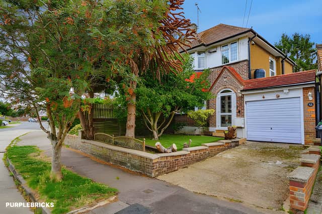 The semi-detached house on Mountfield Road has a driveway and garage, providing off-street parking in the Adeyfield area of Hemel Hempstead