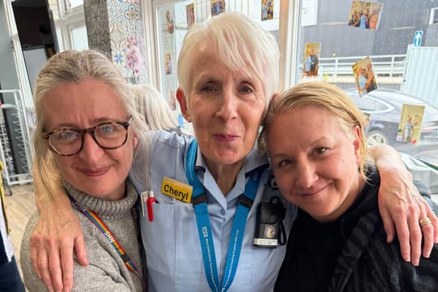 Cheryl (pictured centre) with two colleagues