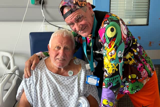 Volunteer Mark (pictured right) with patient Michael