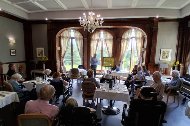 Bushey Auctions giving a presentation
