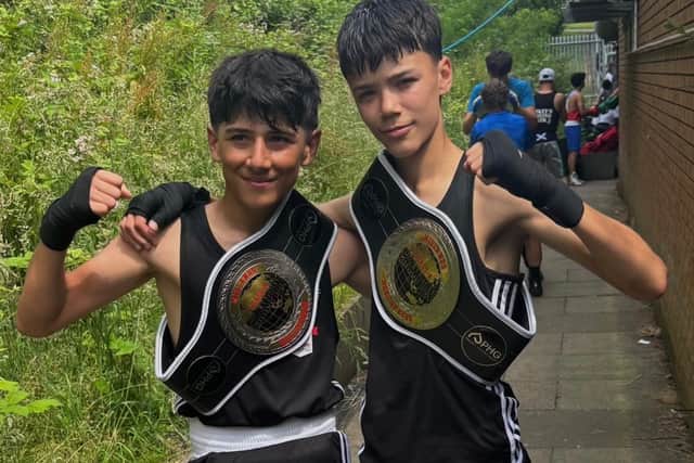 Samir Omid (left) and Kai Paice (right) with their winner’s belts