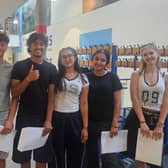 Students celebrating their results together.