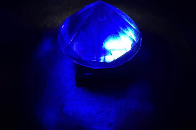 Young adventurers must search the mine to find the blue crystals.