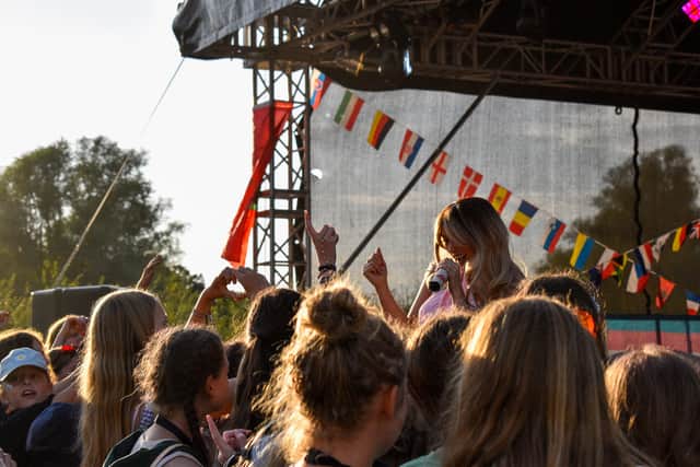 Girls enjoying Sabrina Carpenter tribute performance