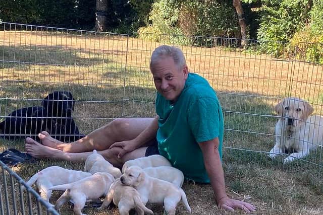 David with Luna and her puppies