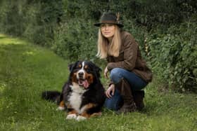 Tring-based Clinical Animal Behaviourist Hanne Grice, pictured with Dylan, is reminding dog owners that it's OK to comfort frightened pets when they seek reassurance during fireworks.