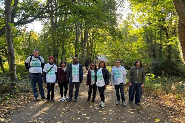 West Herts Hospitals Charity Senior Fundraising Officer Alex Murray, his mother Pauline, and members of the neonatal team passing through Cassiobury Park during The Big Little Trail.