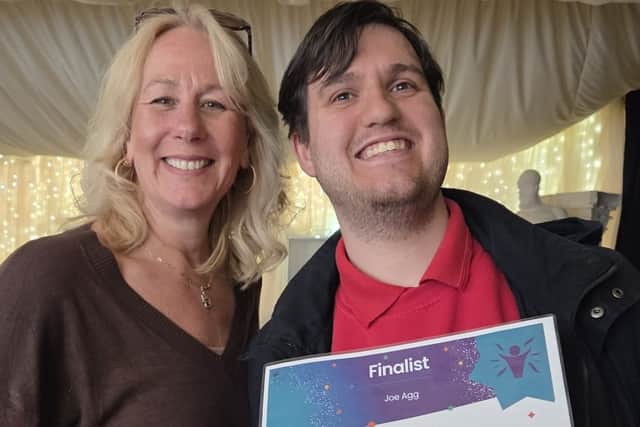 Winner Joe Agg celebrating his victory with supporter Nicky