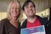 Winner Joe Agg celebrating his victory with supporter Nicky