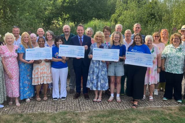 Presenting cheques to mental health charities in 2025