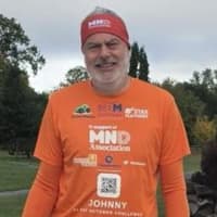 John runs every day in October to help raise awareness of Motor Neurone Disease