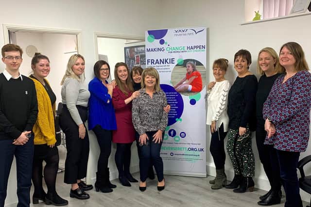 Rita Ross, trustee and co-founder of Reverse Rett, centre, with the hr inspire team including Sandra McLellan, third on right, director of hr inspire.